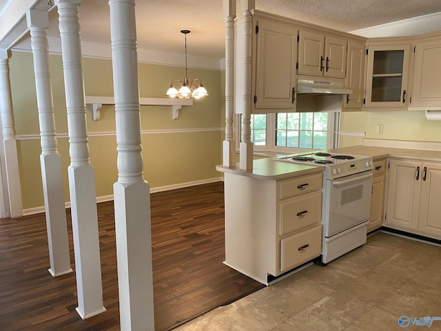 kitchen with a textured ceiling, a chandelier, light countertops, under cabinet range hood, and electric range