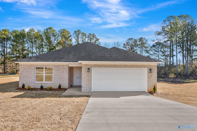 ranch-style house with brick siding, an attached garage, driveway, and a front yard