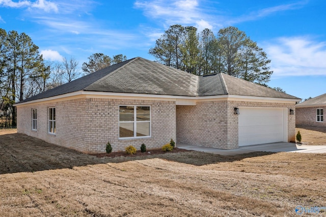 ranch-style house with brick siding, an attached garage, a shingled roof, and driveway