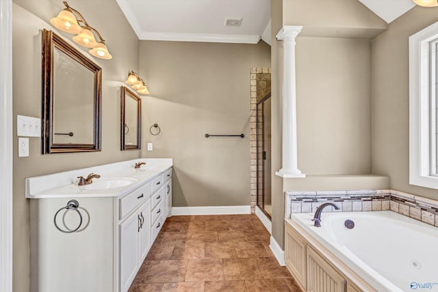 bathroom with a healthy amount of sunlight, separate shower and tub, and decorative columns