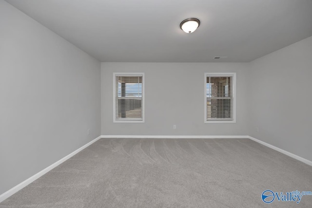 view of carpeted spare room