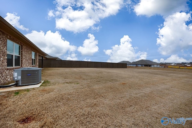 view of yard with central AC