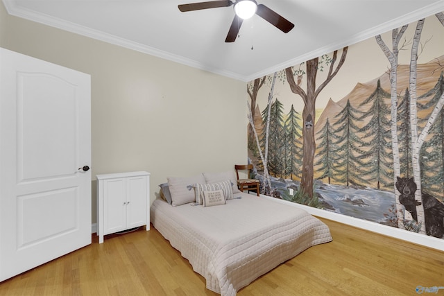 bedroom featuring ceiling fan, light wood-type flooring, and ornamental molding