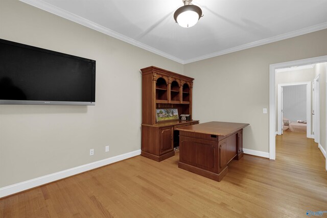 office space with light hardwood / wood-style floors and crown molding