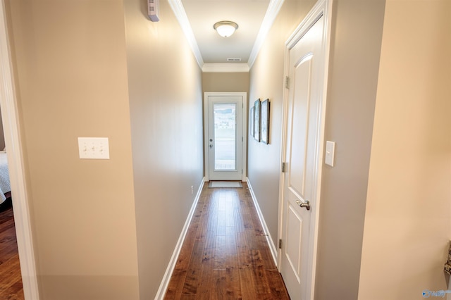 2522 Lindisfarne Dr SW, Decatur, AL 35603 - hallway with dark wood-style flooring, ornamental molding, and baseboards
