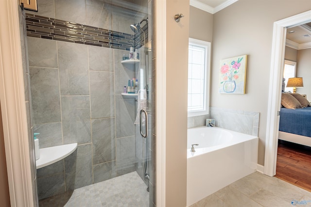 2522 Lindisfarne Dr SW, Decatur, AL 35603 - ensuite bathroom with ornamental molding, a shower stall, and a garden tub