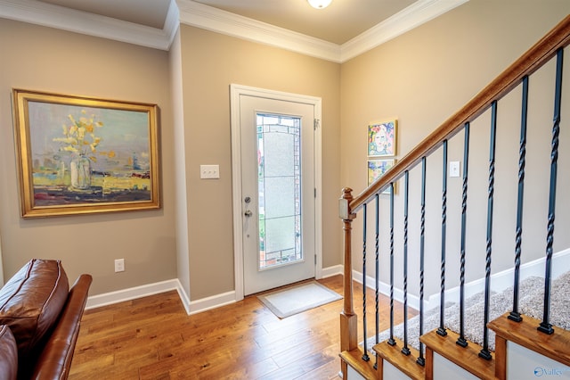 2522 Lindisfarne Dr SW, Decatur, AL 35603 - foyer featuring hardwood / wood-style floors, crown molding, baseboards, and stairway