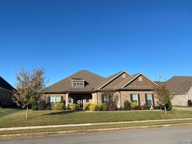 view of front of home with a front lawn