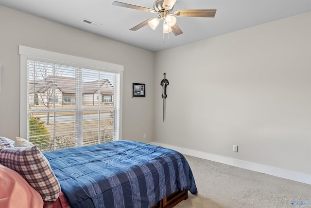 bedroom featuring ceiling fan and carpet flooring