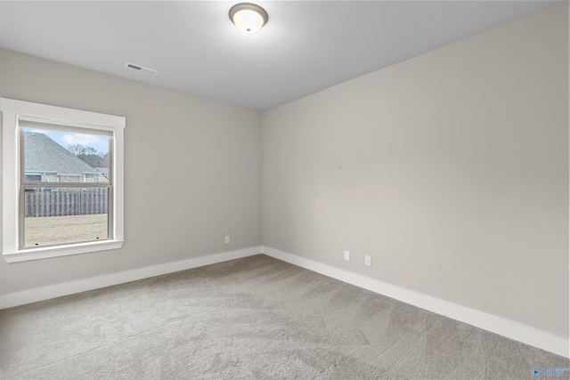 empty room featuring carpet flooring