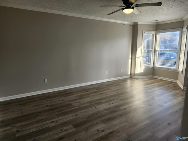 unfurnished room with crown molding, baseboards, dark wood-style floors, a textured ceiling, and a ceiling fan