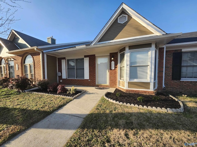 view of front of property with brick siding