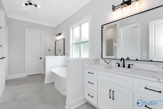 bathroom featuring vanity, ornamental molding, concrete floors, and a tub