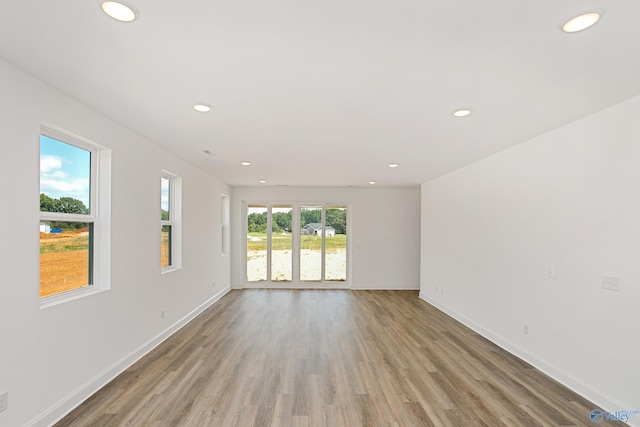 empty room featuring hardwood / wood-style flooring