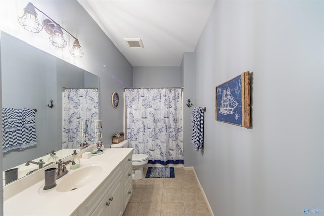 bathroom with vanity, tile patterned flooring, toilet, and a shower with shower curtain