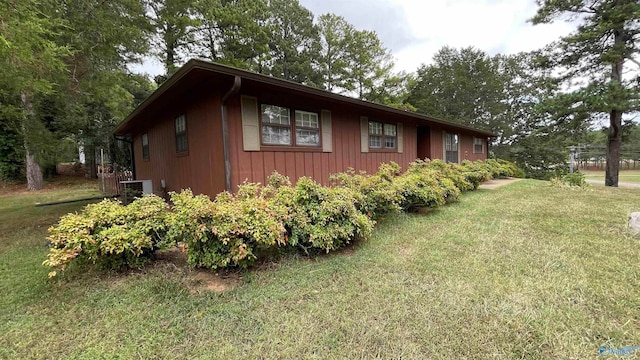 view of property exterior featuring a yard