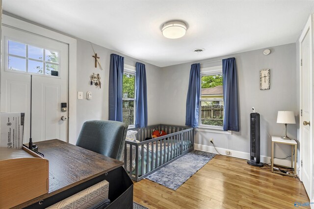 1213 Humes Ave NE, Huntsville, AL 35801 - bedroom featuring wood finished floors and baseboards