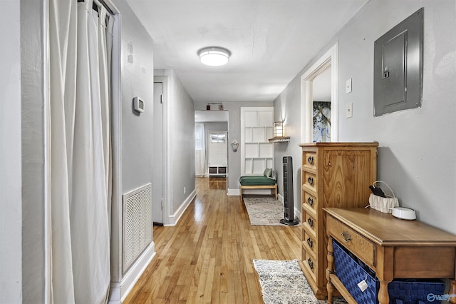 1213 Humes Ave NE, Huntsville, AL 35801 - corridor with electric panel, baseboards, light wood-type flooring, and visible vents