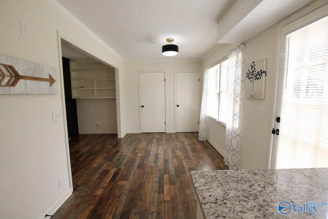 2520 Excalibur Dr SE, Huntsville, AL 35803 - entrance foyer with dark wood-type flooring and crown molding