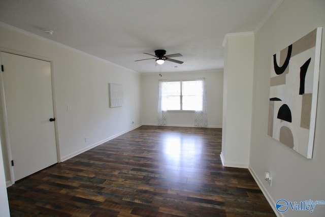 2520 Excalibur Dr SE, Huntsville, AL 35803 - unfurnished room with ceiling fan, crown molding, dark wood finished floors, a smoke detector, and baseboards