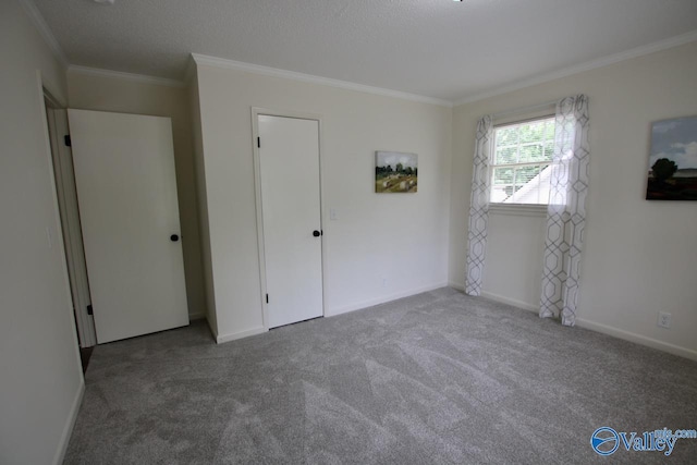2520 Excalibur Dr SE, Huntsville, AL 35803 - unfurnished bedroom with carpet, ornamental molding, and baseboards