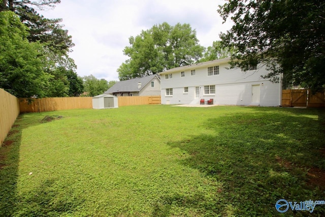 2520 Excalibur Dr SE, Huntsville, AL 35803 - view of yard featuring a storage shed, a patio area, and an outbuilding