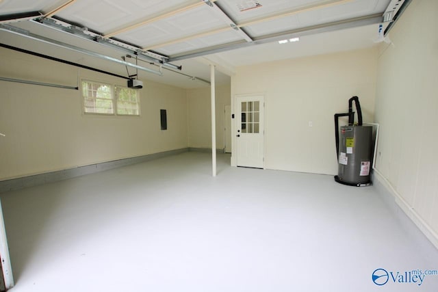 2520 Excalibur Dr SE, Huntsville, AL 35803 - garage with water heater and a garage door opener
