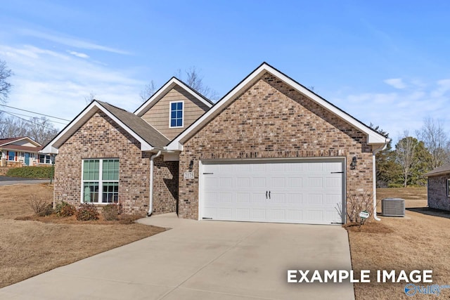 view of front of house with brick siding, an attached garage, central air condition unit, and driveway