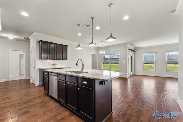 107 Duchess Dr, Madison, AL 35758 - kitchen featuring stainless steel dishwasher, crown molding, healthy amount of natural light, open floor plan, and a center island with sink