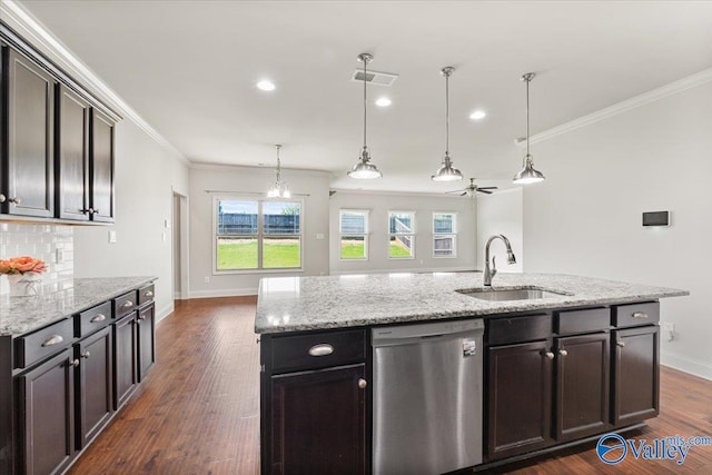 107 Duchess Dr, Madison, AL 35758 - kitchen featuring stainless steel dishwasher, crown molding, decorative backsplash, an island with sink, and pendant lighting