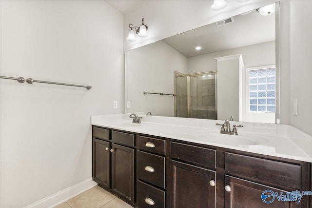 107 Duchess Dr, Madison, AL 35758 - full bath featuring tile patterned floors, double vanity, and a shower stall