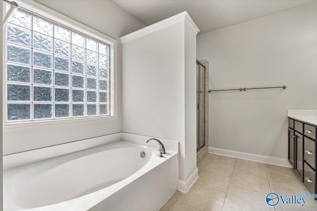 107 Duchess Dr, Madison, AL 35758 - full bathroom featuring a bath, vanity, tile patterned floors, and a shower with door