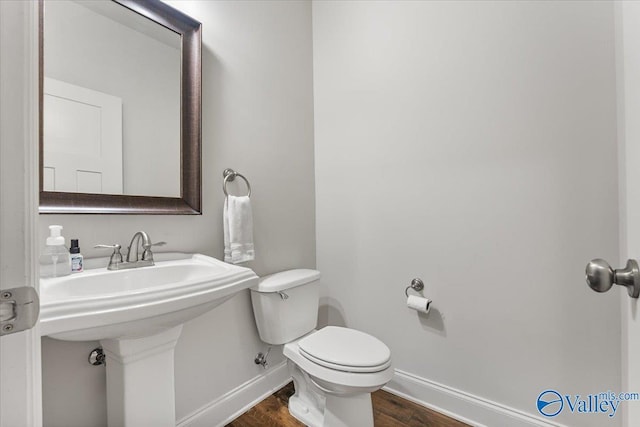 107 Duchess Dr, Madison, AL 35758 - half bathroom with baseboards and wood finished floors