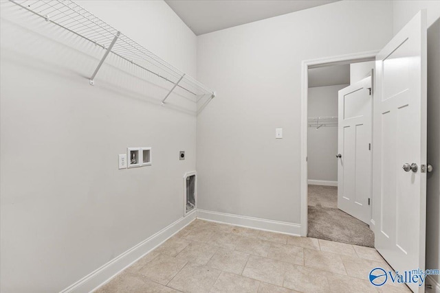 107 Duchess Dr, Madison, AL 35758 - laundry area featuring washer hookup, hookup for an electric dryer, and light tile patterned floors