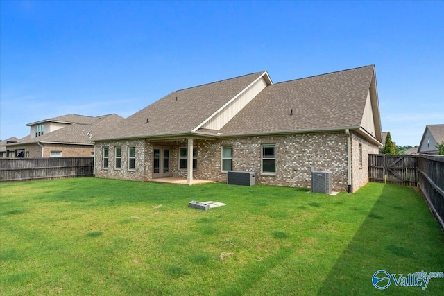 107 Duchess Dr, Madison, AL 35758 - rear view of property with a fenced backyard, brick siding, a shingled roof, and a patio area