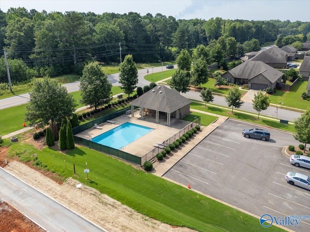 107 Duchess Dr, Madison, AL 35758 - drone / aerial view of a pool and a heavily wooded area
