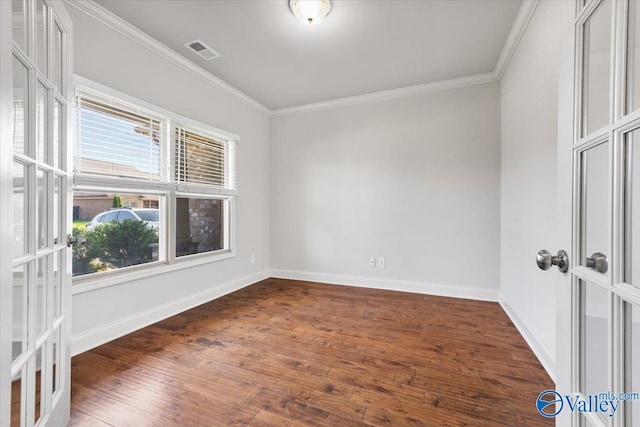 107 Duchess Dr, Madison, AL 35758 - unfurnished room featuring crown molding, wood finished floors, and french doors