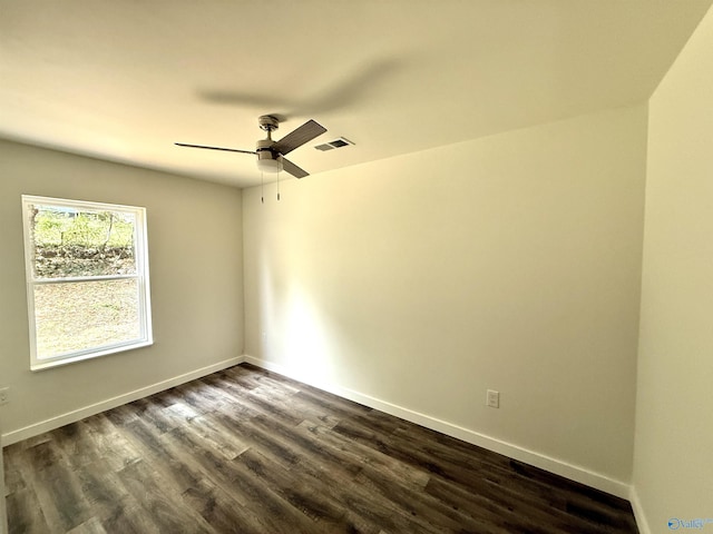 42 Wilkinson Ave E, Gadsden, AL 35904 - spare room featuring dark wood-style floors, a ceiling fan, and baseboards