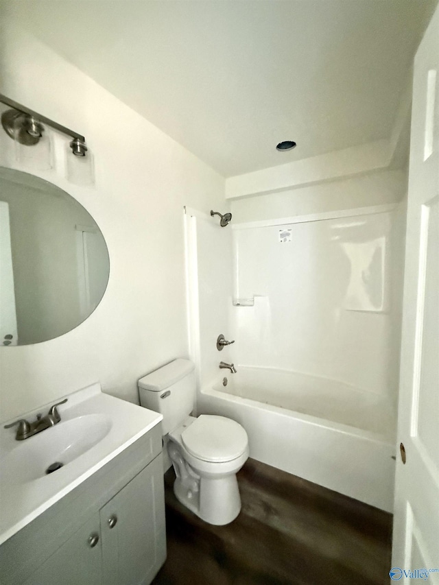 42 Wilkinson Ave E, Gadsden, AL 35904 - full bath featuring vanity, wood finished floors, toilet, and shower / bathtub combination