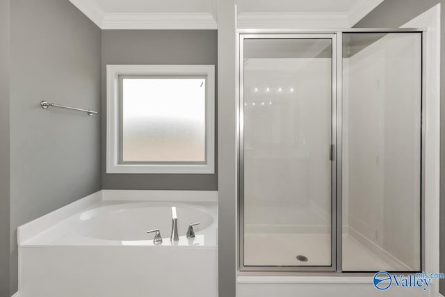full bath featuring a bath, ornamental molding, and a shower stall