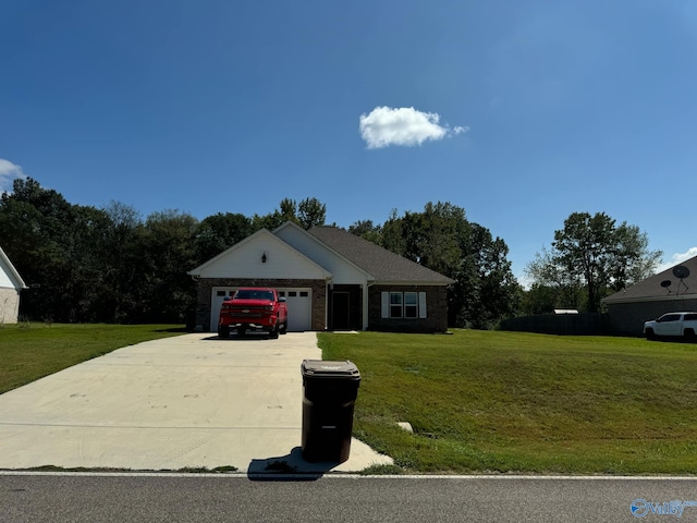 ranch-style home featuring a front lawn and a garage