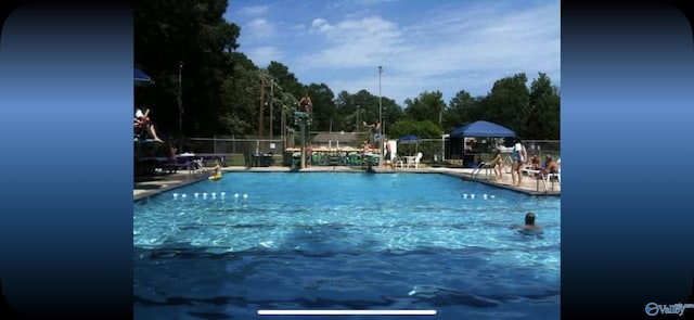 528 Delaney Rd, Huntsville, AL 35806 - community pool with a patio area
