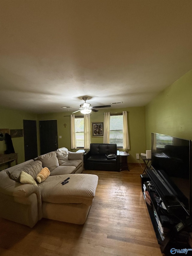 528 Delaney Rd, Huntsville, AL 35806 - living area with wood finished floors and ceiling fan