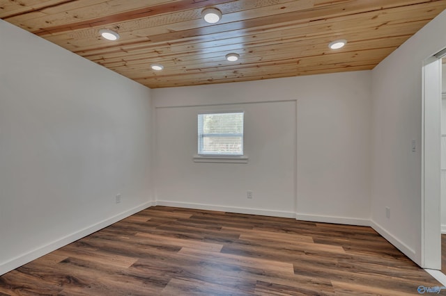 unfurnished room with wooden ceiling and dark wood-type flooring