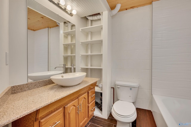 bathroom with wood ceiling, toilet, and vanity