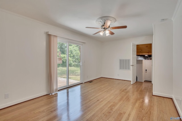 empty room featuring ceiling fan, light hardwood / wood-style flooring, and crown molding