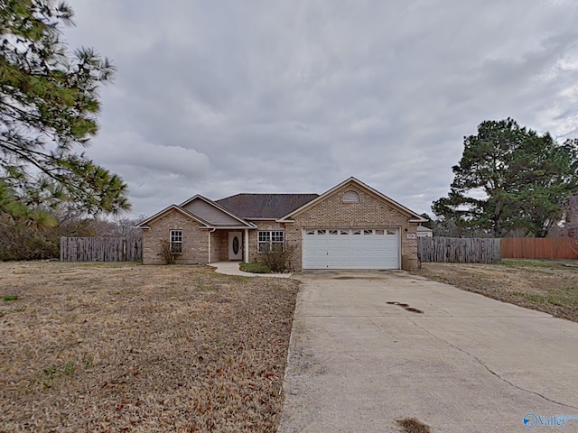 ranch-style home with a garage