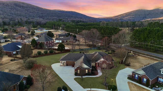 aerial view at dusk with a mountain view