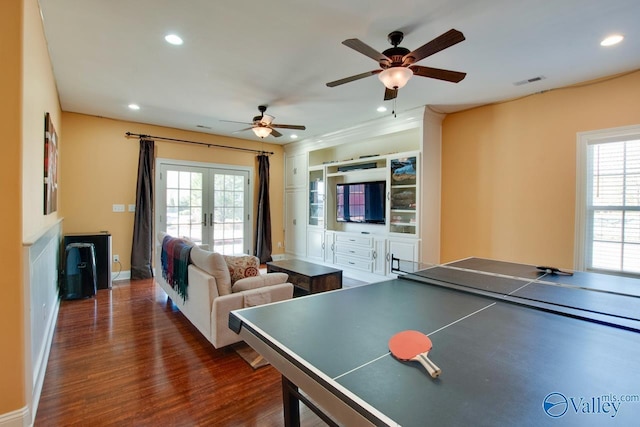 recreation room with recessed lighting, visible vents, dark wood-style flooring, and french doors