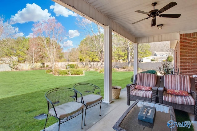 view of patio featuring ceiling fan and a fenced backyard